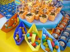 a table topped with lots of candy and candies