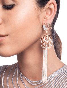 Editor's Note For The Love Of Flexibility And Fluidity, Endless Strands Of Lustrous Pearls, The Lophorina Tassel Treasure Earrings Epitomizes Grace And Elegance. Delightfully Capturing Fluidity, The Luxurious Power Jewel Has Been Artfully Sculpted With Accents Of Faunal Sightings. Delicately Handcrafted To Perfection, Luxury Par Excellence, The Lophorina Tassel Treasure Earrings Is A Statement In Itself. Material: Brass Plating: Rosegold Care: Store your jewelry in a box away from humidity or ex Trending Earrings, Designer Tassels, Earrings Fancy, Earrings For Wedding, Bridal Earring, Charms Necklace, 22 Carat Gold, Earring Designs, Fancy Earrings