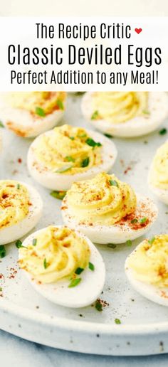 deviled eggs on a plate with text overlay that reads the recipe critic classic deviled eggs perfect addition to any meal