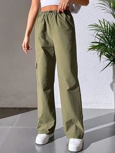 Stay effortlessly stylish with our Casual Plain Cargo Cropped Pant. These pants feature a cropped length and a clean, plain design, offering a versatile and contemporary style. With a relaxed fit and comfortable fabric, they are perfect for casual and everyday wear. These cargo cropped pants are a must-have addition to your wardrobe for a trendy and laid-back look.Specification: Style: Casual Pattern Type: Plain Type: Cargo Pants Closure Type: Elastic Waist Details: Pocket Waist Line: Natural Le Fitted Ankle-length Cargo Pants In Solid Color, Khaki Ankle-length Parachute Pants With Pockets, Khaki Wide-leg Cargo Pants With Elastic Waistband, Solid Color Ankle-length Cargo Pants With Elastic Waistband, Khaki Ankle-length Parachute Pants With Elastic Waistband, Cropped Pants, Cargo Pants, Elastic Waist, Contemporary Style