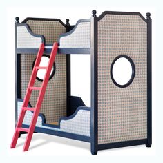 a child's bunk bed with a red ladder