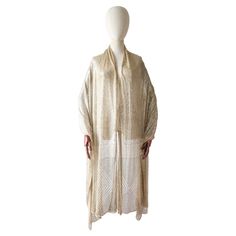 This breathtaking 1920's cream cotton mesh asssuit shawl, stamped with a grid and geometrical diamond design along each of the extremities, is a piece of true fashion history. Her wonderful weight, allows for the shawl to drape effortlessly over the shoulders, creating that timeless 1920's look. Perfect for wearing over any evening attire, or more casually to add a little bit of sparkle to your day. Label: None Measurements: Length: 98 inches Width: 30 inches Condition: This shawl is in near per 1920s Looks, Hammered Metal, Egyptian Cotton, Evening Attire, Metal Work, Diamond Design, Metal Design, Fashion History, Washing Instructions