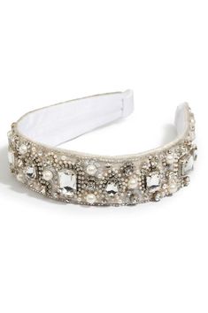 Add a regal touch to your outfit with silver  crystals and a shimmer white base, to add elegance to your ensemble.         100% Polyester Satin foil    Dry Clean only Embellished Headband, Embellished Headbands, Jewelry Candles, Denim Sweater, Sugar Plum, Polyester Satin, Your Outfit, Sneaker Heels, Personalized Accessories