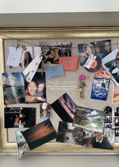 a bulletin board covered in pictures and magnets