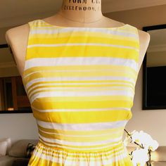 Lilly Pulitzer Silk Striped Dress Fit And Flare Style Classic Spring Style Size 8 Us Total Length Approx 38" Skirt Drop From Waist 23" 100% Silk Self 100% Acetate Lining For A Fuller Body Underskirt Good Used Condition Lightly Worn A Seam Pulling - See Pic- It's A Simple Repair Yellow A-line Midi Dress For Garden Party, Yellow Lined Midi Dress, Yellow Lined Midi Dress For Summer, Yellow Lined Fitted Midi Dress, Yellow Fitted Lined Midi Dress, Yellow Fitted Midi Dress, Lined, Yellow Fitted Midi Dress With Lining, Chic Yellow Lined Midi Dress, Elegant Yellow Lined Midi Dress