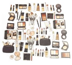 an assortment of cosmetics and makeup products arranged in a circle on top of each other