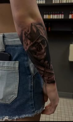 a person with a tattoo on their arm