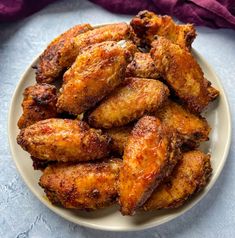 fried chicken wings on a white plate