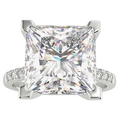 a princess cut diamond ring with pave set shoulders