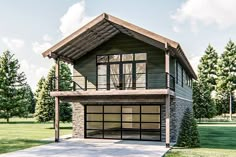 a two story house with an attached garage in the middle of a grassy area next to trees