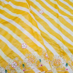 Category: Leheriya Tussar Dupatta Check out this latest collection of Tussar dupattas from Khinkhwab, the online shop bringing the essence of Handloom Banarasi silk. Fabric - Pure Tussar Silk Color - Yellow Craftsmanship: Pearl & Zardozi Embroidery Note- There may be slight color variations due to photographic reasons. This is a hand-woven product. Any irregular weaving or pattern should not be considered a defect. These irregularities make every handloom piece unique. Katan Silk Unstitched Saree Suit With Gota Work, Traditional Slub Silk Dupatta With Dori Work, Designer Katan Silk Dupatta With Gota Work, Bollywood Style Slub Silk Dupatta With Dori Work, Yellow Resham Embroidered Art Silk Dupatta, Semi-stitched Slub Silk Dupatta With Dori Work, Slub Silk Dupatta With Dori Work In Traditional Drape, Unstitched Yellow Katan Silk Sets, Traditional Yellow Dupatta For Designer Wear