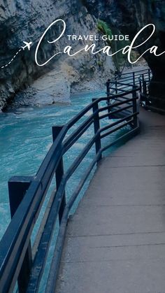 a bridge that is next to the water and some mountains with text overlaying it