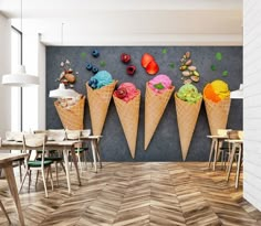 three cones of ice cream with different toppings are on the wall in this restaurant