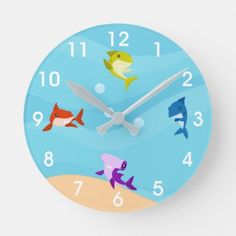 a blue clock with different sea animals on it