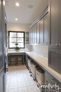 the kitchen is clean and ready to be used as a laundry room or office space