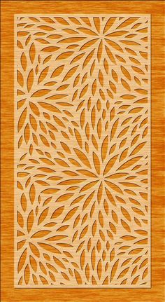 an intricate laser cut design on wood