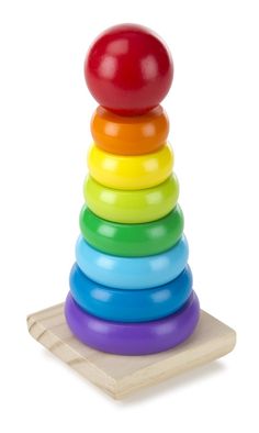 a wooden stacking toy with different colored balls on it's top and bottom