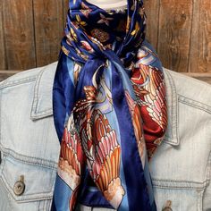 Our classic wild rag/scarf  in a blue color is accented with a multi-floral pattern. A perfect square - measuring 35"x35". Adding that extra touch of a western style to your outfit. 100% soft silk feeling polyester is durable to keep you warm in the cold and fashionable for any occasion. Plus it's machine washable!  Additional accessories are available- (Please see our slide options on our site)  *Leather slides *Western concho slides *Crystal concho slide  *Buckle slides Outfit Western, Bright Pop, Perfect Squares, Wild Rag, Rodeo Drive, Hooded Scarf, Leather Slides, Western Style, Plaid Scarf