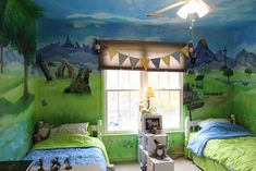 two beds in a room with green walls and paintings on the wall, one is blue and the other is green