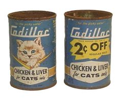 two canisters with cats on them sitting next to each other