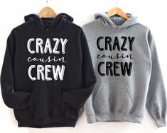 Celebrate the love of family with matching sweatshirts from Crazy Cousin Crew and get your crew on! This comfortable hoodie sweatshirt will be your and your friends' favorite! Be simple, be different! M A T E R I A L S → Gildan® Heavy Blend™ Adult Hooded Sweatshirt → 50% Cotton / 50% Polyester → Classic Fit → Fabric 271 g/m² → Preshrunk fleece knit → Double-lined hood with colour-matched drawcord → Double-needle stitching at shoulder, armhole, neck, waistband and cuffs → Pouch pocket → 1 x 1 rib Cousin Ideas Fun, Winter Hoodie With Lettering And Long Sleeves, Family Occasion Sweatshirt With Letter Print And Long Sleeves, Family Letter Print Long Sleeve Sweatshirt, Family Occasion Letter Print Long Sleeve Sweatshirt, Cotton Hooded Top With Lettering, Family Matching Black Sweatshirt For Winter, Family Matching Black Winter Sweatshirt, Fall Long Sleeve Sweatshirt