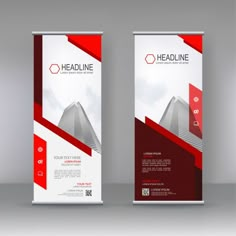 two roll up banners with red and white shapes