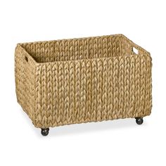 a large woven basket on wheels with handles