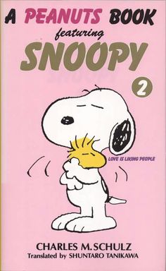 a peanuts book featuring snoopy 2