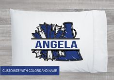 personalized pillow case with blue and white design for an angela logo on it