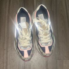 Like Only Wore A Couple Of Authentic Gucci Women’s Rhyton Gg Supreme Logo Sneakers - Size 8.5 Description: Step Up Your Sneaker Game With These Authentic Gucci Rhyton Gg Supreme Logo Sneakers, Size 8.5. These Luxurious Sneakers Feature A Blend Of The Iconic Gg Monogram Print And Contrasting Leather Panels In Neutral And Pastel Shades. The Chunky Sole Provides Comfort And An On-Trend Look, While The Lace-Up Closure Ensures A Secure Fit. Perfect For Casual Streetwear Or Elevating Your Everyday Out Gucci Rhyton, Supreme Logo, Gucci Women, Gucci Sneakers, Gg Monogram, Sneaker Games, Monogram Prints, Pastel Shades, Everyday Outfit