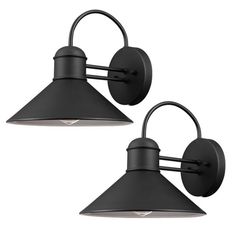 two black wall lights with one light on each side and the other off to the side