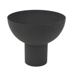 a black bowl sitting on top of a table