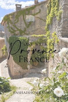 the words one week in france written over a photo of an old stone building with ivy growing on it