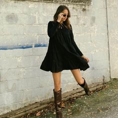 This Simple Yet Stunning Tiered Dress Features A Crew Neckline, Long Sleeves, And Is Fully Lined. Black Tiered Mini Dress For Party, Black Casual Tiered Dress, Pretty Black Long Sleeve Dress Tiered, Black Bohemian Tiered Maxi Dress, Long Sleeve Tiered Babydoll Dress, Black Tiered Dress, Tiered Dress, Black Dress, Colorful Dresses