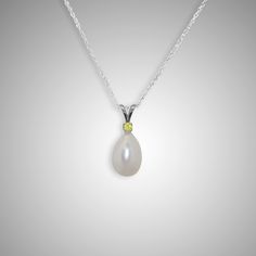 When it comes to beauty this pearl pendant speaks for itself, and the color yellow is reminiscent of sunshine to warm your heart throughout the day. The pearl in this piece is 8 mm x 9 mm, and it has a wonderful color. The simple setting allows the pearl to be the main focus of attention. This pendant works with one of your elegant outfits as well as your jeans and t-shirt. Linda Allard holds a graduate pearl certification from Gemological Institute of America (GIA) and carefully inspects each p Yellow Pearl Jewelry Gift, Yellow Pearl Necklace As Gift, Yellow Pearl Necklace Gift, Yellow Round Pearl Necklace Gift, Yellow Round Pearl Necklace As A Gift, Yellow Pearl Necklace As A Gift, Yellow Pearl Necklace For Gift, Yellow Pearl Pendant Jewelry, Yellow Pearl Drop Jewelry Gift