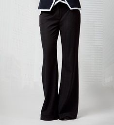 Elevate your work wardrobe with the Anna Tailored Trousers, designed for the modern professional. These trousers are expertly crafted from 100% wool, offering a perfect blend of comfort and sophistication. The low-cut design sits at the waist, providing a flattering fit that combines style and functionality. The Anna Trousers feature wide legs that create a sleek and elegant silhouette, ideal for the office or formal occasions. Front pockets add practicality without compromising the clean lines Elegant Career Trousers, Elegant Wide Leg Career Pants, Elegant Wide-leg Career Pants, Fitted Trousers For Work, Professional Office Pants With Welt Pockets, Tailored Wide Leg Dress Pants For Career, Tailored Dress Pants With Pockets For Work, Classic Work Pants For Workwear, Classic Work Trousers