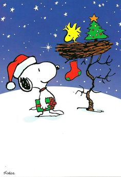 a charlie brown christmas card with a tree and snoop's stocking on it