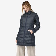 Now made with 100% recycled polyester materials, our citizens’ favorite quilted, insulated parka keeps you warm, cozy and comfortable in flattering, sporty style. Made in a Fair Trade Certified™ factory. - Black Modern Feminine, Patagonia Jacket, Exposed Zipper, Patagonia Womens, Sporty Style, Lining Fabric, Hand Warmers, Fair Trade, Patagonia