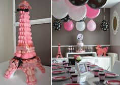 a pink and black party with balloons in the shape of the eiffel tower