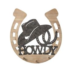 a wooden sign with a cowboy hat on it