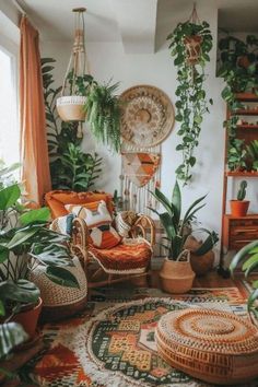 a living room filled with lots of plants and potted plants on top of rugs