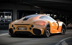 an orange sports car driving down a street next to a parking garage area with stairs