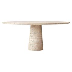 a white table with a round top and two small circular bases on the base is made out of concrete