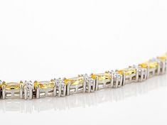 Bella Luce ® canary and white diamond simulants 11.62ctw round and oval, rhodium over sterling silver bracelet. Measures approximately 7 1/4"L x 3/16"W and has a hidden box clasp. The diamond equivalent weight is 7.02ctw. Yellow Bracelet Jewelry For Anniversary, Fine Jewelry Yellow Cubic Zirconia Jewelry, Exquisite Yellow Gold Cubic Zirconia Bracelets, Yellow Gold Cubic Zirconia Bracelet, Classic Yellow Bracelet, Fine Jewelry Yellow Oval Jewelry, Fine Jewelry Oval Yellow Jewelry, Oval Yellow Cubic Zirconia Jewelry, Yellow Sterling Silver Bracelet