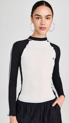 Sporty Long Sleeve Activewear, Elastane, Long Sleeve Elastane Sportswear Tops, White Stretch Rash Guard For Spring, Spring Fitted Long Sleeve Rash Guard, Fitted Long Sleeve Rash Guard For Spring, Elastane Long Sleeve Sports Tops, Casual Stretch Rash Guard With Crew Neck, Casual Stretch Crew Neck Rash Guard, Long Sleeve Elastane Sports Tops