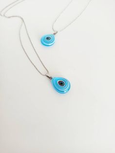 ⭐️Murano Glass Evil Eye Pendants are tear drop shaped. ⭐️Height of the evil eye pendant is 2 cm(0.78 in) ⭐️Lenght of the evil eye necklace is 23 cm(9 in) For more evil eye necklaces, click the link below; https://www.etsy.com/shop/EyeDesignsbyGG?ref=search_shop_redirect&section_id=30285329 Blue Teardrop Spiritual Jewelry, Blue Drop Necklace For Gift, Blue Drop Necklaces For Gifts, Handmade Blue Teardrop Pendant Necklace, Nazar Jewelry, Blue Eye Necklace, Nazar Necklace, Glass Evil Eye, Turkish Eye