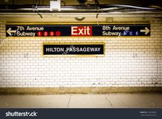 an exit sign at the subway station