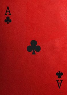 playing cards with ace and spades on the red background, close up view from above