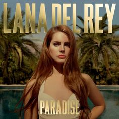 a woman standing in front of a pool with palm trees behind her and the words paradise on it