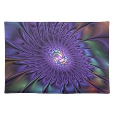 an abstract purple flower with green and blue petals